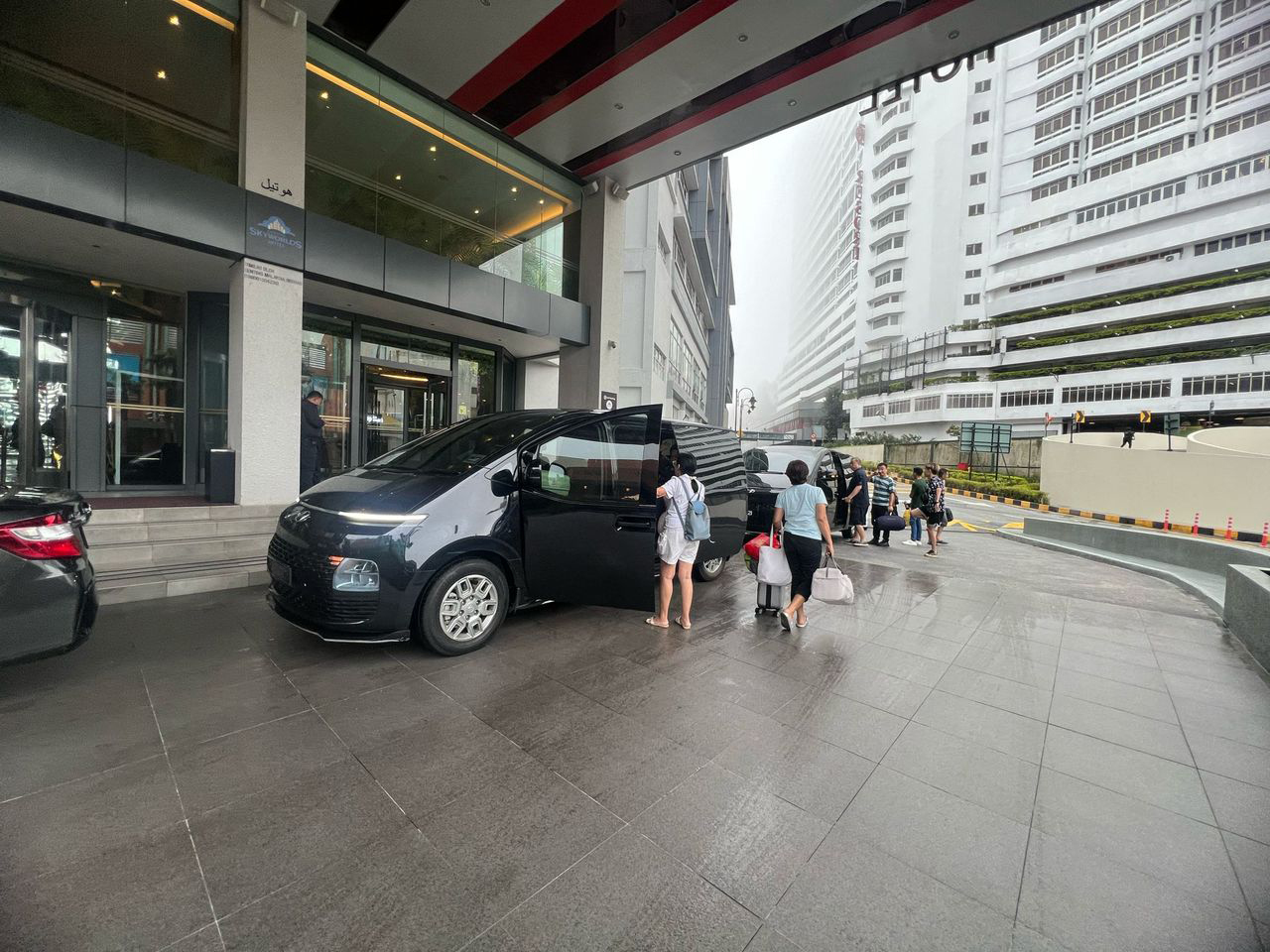 Cross-border private transport for Malaysia day tour